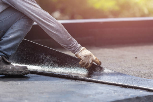 Professional Basement Waterproofing technician working in Victor, ID